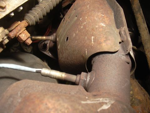 1996 Ford Crown Victoria - This image shows a catalytic converter and oxygen sensors, not a 1996 Ford Crown Victoria.