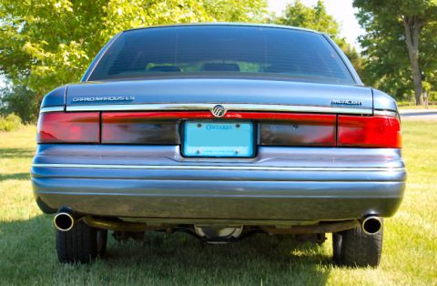 1985 Mercury Grand Marquis - Blue Mercury Grand Marquis LS seen from the rear with an Ontario license plate.