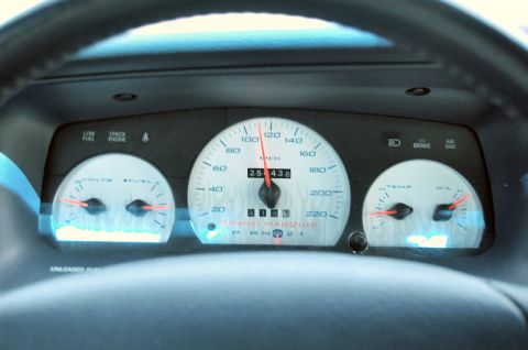 1985 Mercury Grand Marquis - The dashboard shows the speedometer, fuel, temperature, and oil gauges, along with the odometer reading.