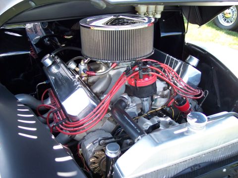 1972 Ford Ranchero - Close-up view of a modified engine bay, highlighting custom components and wiring.
