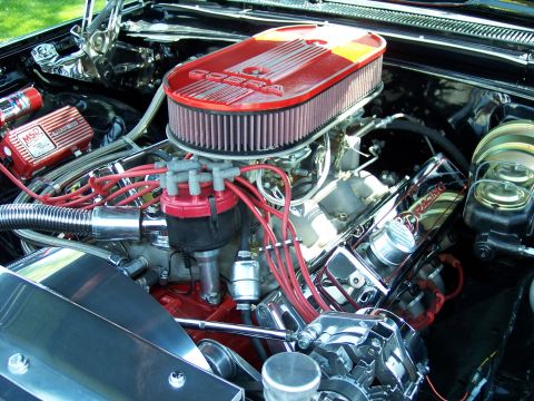 1972 Ford Ranchero - The engine bay features a performance V8 with a Cobra air intake and MSD ignition components.