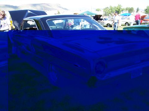 1972 Ford Ranchero - Rear view of a 1970s Ford pickup truck at a car show event.