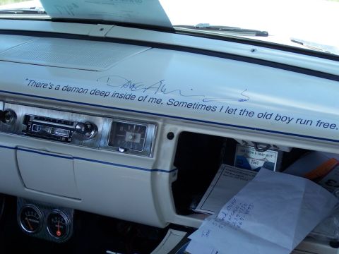 1972 Ford Ranchero - Interior view of a vintage car's dashboard with a quote and signature.