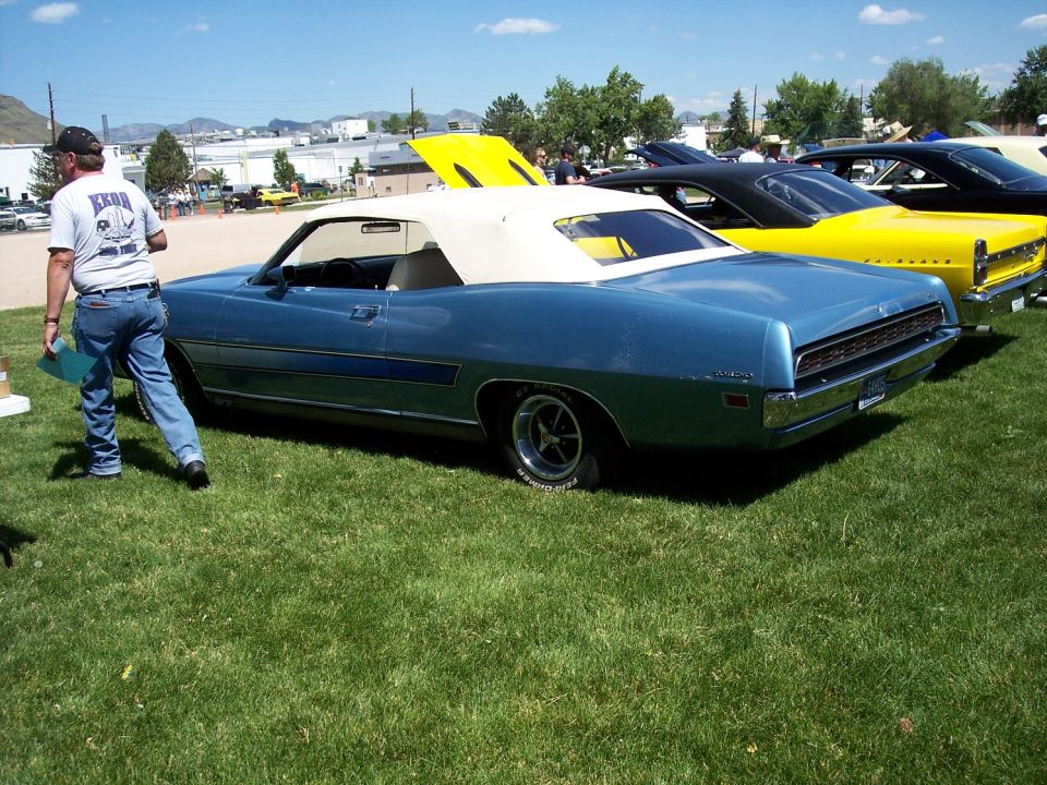 Blue 1972 Ford Ranchero convertible rear view with white top
