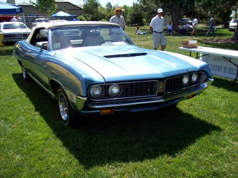 1972 Ford Ranchero - Blue 1970 Ford Torino GT convertible with a white top at a car club picnic.