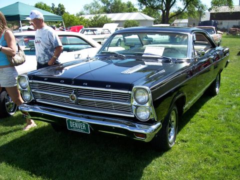 1972 Ford Ranchero - Front view of a black 1966 Ford Fairlane GT at an outdoor car show.
