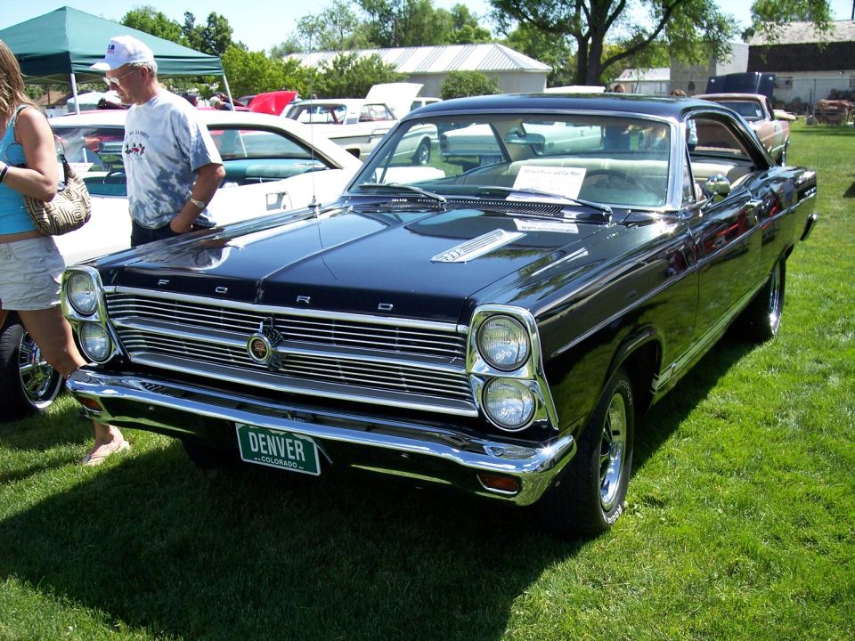 1966 Ford Fairlane GT parked on grass, Denver license plate visible