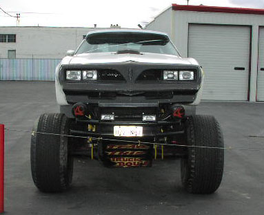 1981 Ford Bronco - This heavily modified truck features a lifted suspension and oversized tires, obscuring its original model year.