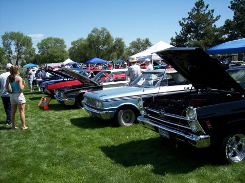1972 Ford Ranchero - A light blue 1964 Ford Falcon Ranchero is displayed with its hood open at a car show, alongside other classic vehicles.