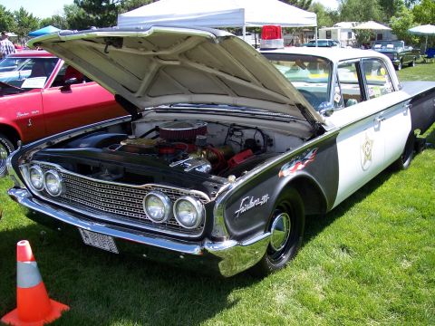 1972 Ford Ranchero - This 1960 Ford Fairlane police car has its hood open, revealing the engine compartment.