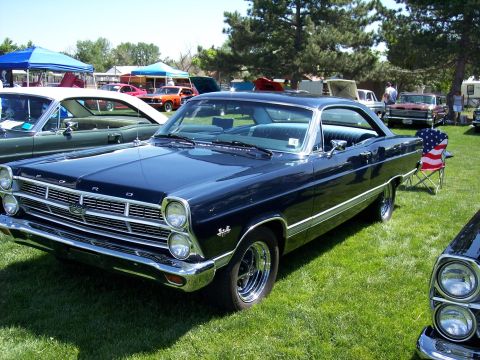 1972 Ford Ranchero - A dark blue 1966 Ford Fairlane convertible is displayed at an outdoor event with other vehicles.