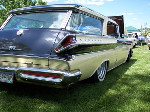 1972 Ford Ranchero - Rear view of a lowered 1958 Mercury Voyager station wagon at an outdoor car show.