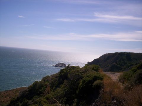 1989 Ford Bronco - Ocean view from a hillside overlooking the water and distant cliffs.
