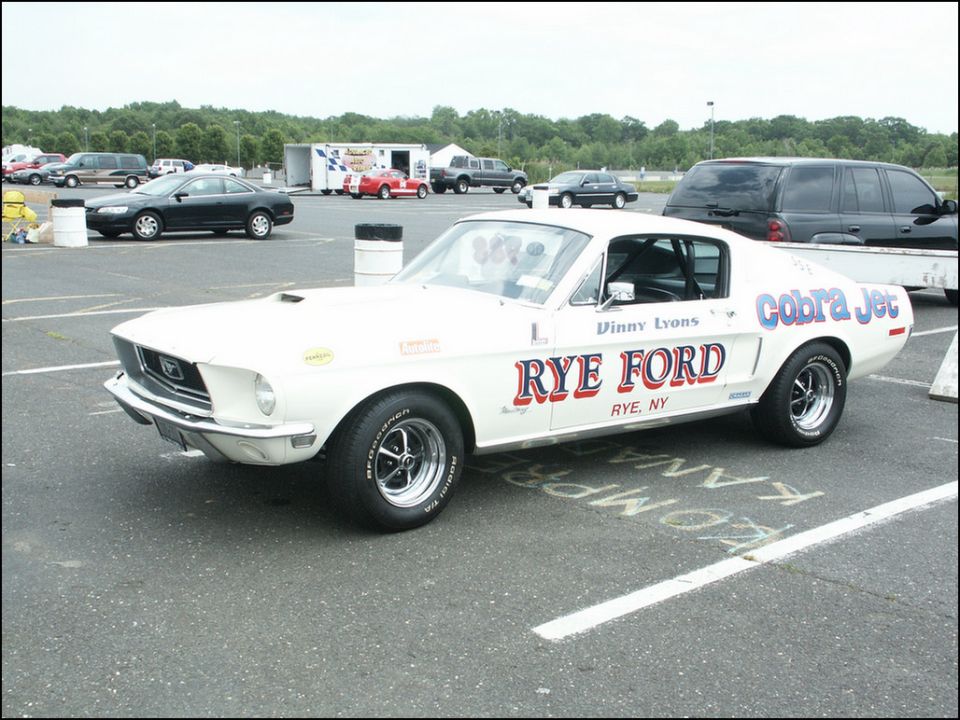 White 1967 Ford Mustang Cobra Jet with RYE FORD livery