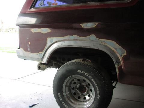 1981 Ford Bronco - Bodywork repair in progress on a 1981 Ford Bronco's rear fender.