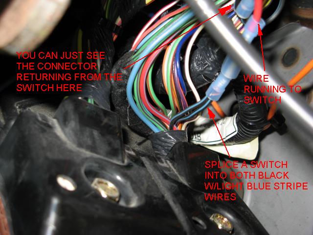 In order to get to these wires, you need to cram your head down by the brake pedal and look up towards the fuse block.  I believe I had to remove some of the tape around the wire harness to access the wires.  You are looking for 2 black w/light blue stripe wires.  One goes to the running board lights, the other to the interior lights.  These wires originate from the same place, so they can be hooked to the same switch without problems.  I cut and joined the pair, ran a lead to the switch, then back to the black w/light blue stripe wires that run into the vehicle.  You need to run 2 switches if you would like to control the running board lights and interior lights seperately.