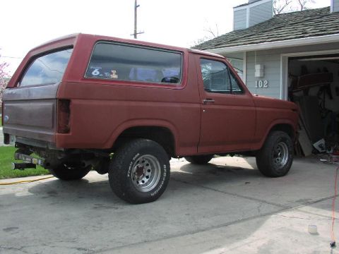 1981 Ford Bronco - This 1981 Ford Bronco is shown from the side, aftermarket wheels and a removable rear section.