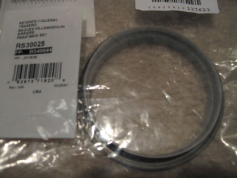 1995 Mercury Cougar - A rear main seal set is shown in its packaging, with part number and barcode visible.