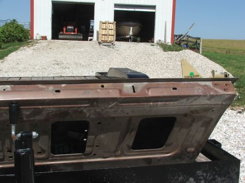 1994 Ford Bronco - This tailgate appears to be from an older model vehicle, possibly a truck or SUV, and is being sold as a part.
