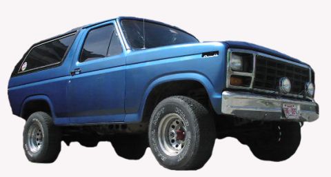 1981 Ford Bronco - A blue SUV with a distinctive grille and body shape, seen from a three-quarter front angle.