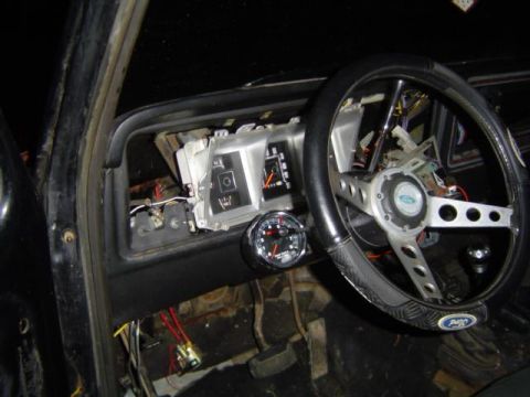 1979 Ford Bronco - Interior view of a 1979 Ford Bronco, the dashboard and steering wheel.
