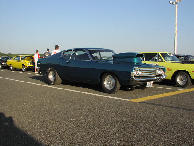 Blue 1969 Ford Torino GT drag car with scoop, side view