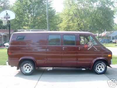 1978 Ford E250 - This 1978 Ford E250 van is shown from the side, chrome wheels and running boards.