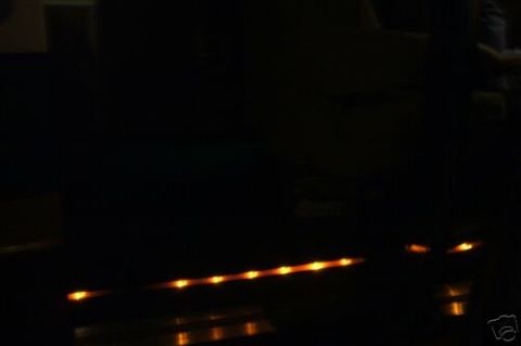 1978 Ford E250 - Interior lights are visible in a dark vehicle.