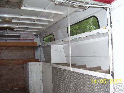 1978 Ford E250 - Interior of a cargo van or truck, showing shelving and diamond plate trim. Date stamp visible.