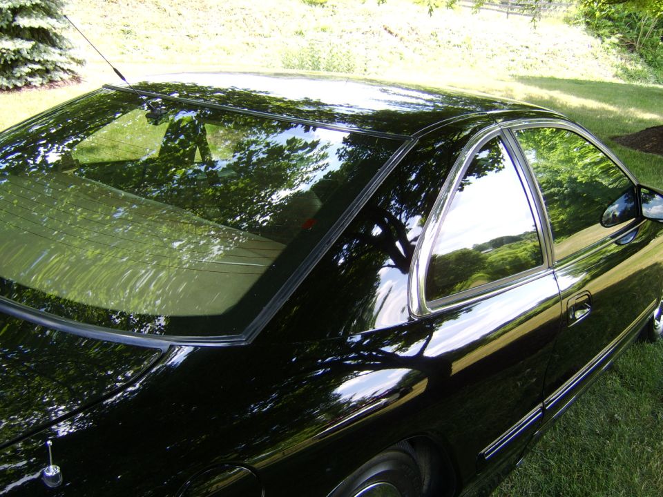 Like many 1993-1998 Mark VIII owners have experienced, wrinkled rear window seals is a common issue.

Most just live with it, but many who know me know that I can't stand things like this. So I came up with an easy solution to solve it. 

Before pics can be seen in the "exterior detailing" subfolder of  "My 1995 Lincoln Mark VIII" folder in album list.