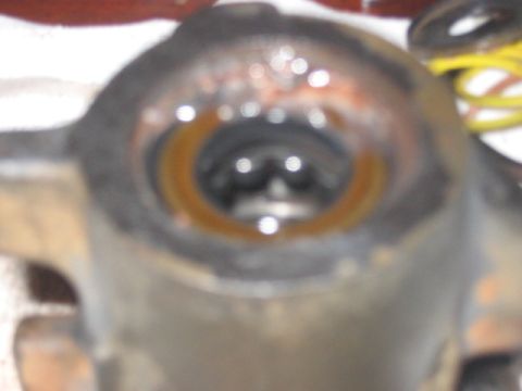 1991 Ford Bronco - This is a close-up view of a mechanical part, possibly from a vehicle's braking or steering system.