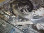 1990 Ford Ranger - Close-up view of the engine bay, showing various hoses and components.