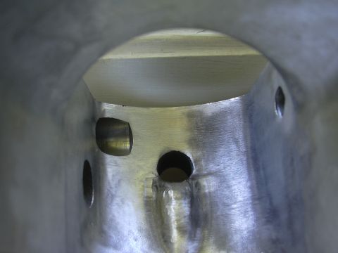 1996 Ford Crown Victoria - Close-up of an engine intake plenum, revealing its internal structure and manufacturing details.