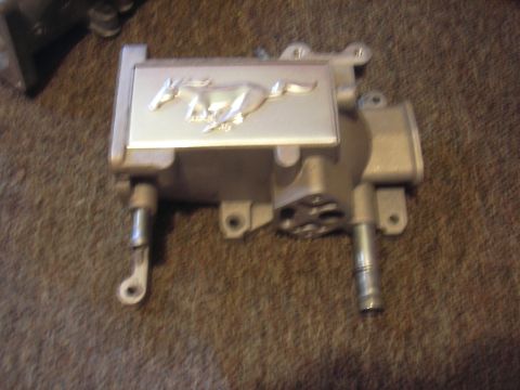1996 Ford Crown Victoria - Intake manifold with a Ford Mustang running horse emblem is shown.