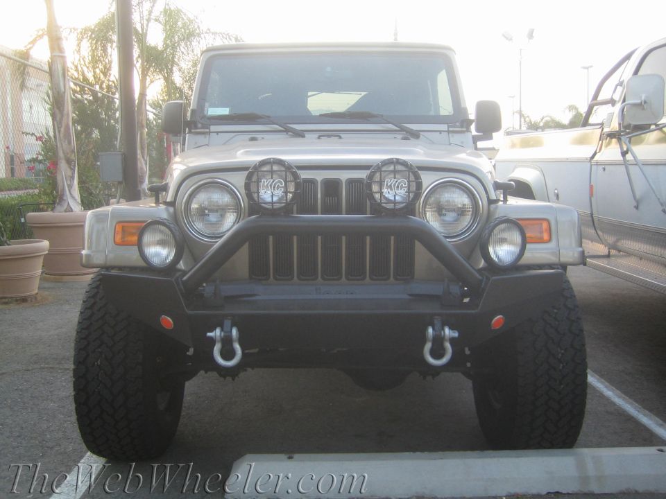 Jeep Wrangler front end with KC lights and aftermarket bumper