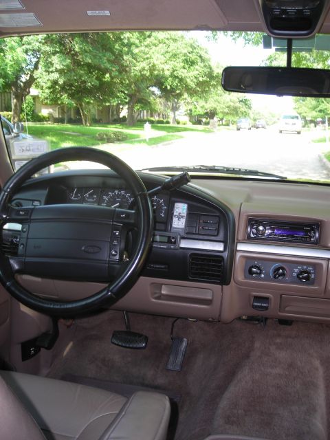 1995 Ford Bronco - Interior view of a 1995 Ford Bronco, the dashboard and driver's controls.