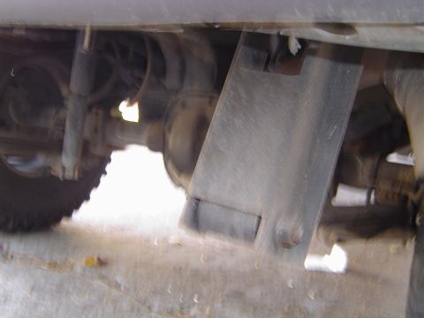 1996 Ford Explorer - Close-up of the rear axle and suspension system of a vehicle.