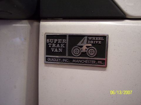 1996 Ford Bronco - This badge indicates a 4-wheel drive conversion, not necessarily the vehicle's model year or manufacturer.