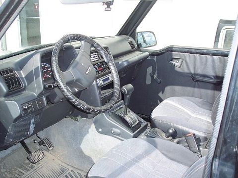 1995 Ford Bronco - Interior of a Suzuki Sidekick, not a 1995 Ford Bronco.