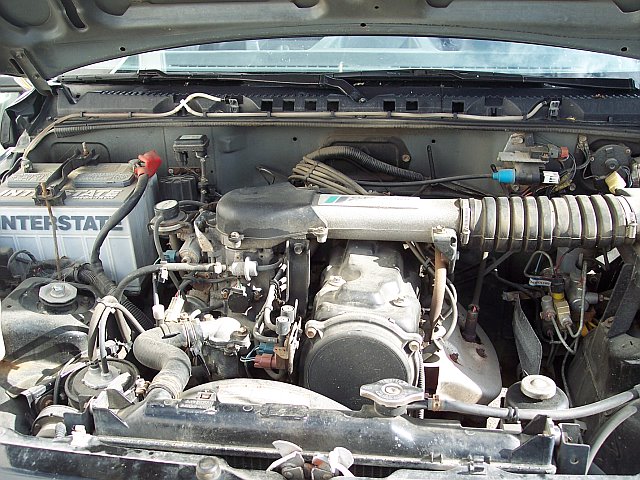 engine bay with Interstate battery and air intake system