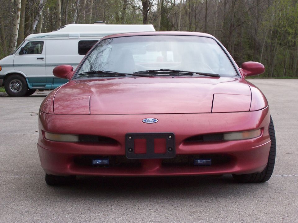 Red 1995 Ford Probe front view