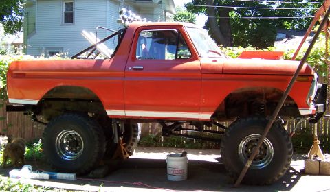 1978 Ford Bronco - This 1978 Ford Bronco is raised on jacks, showing its lifted suspension and large tires.