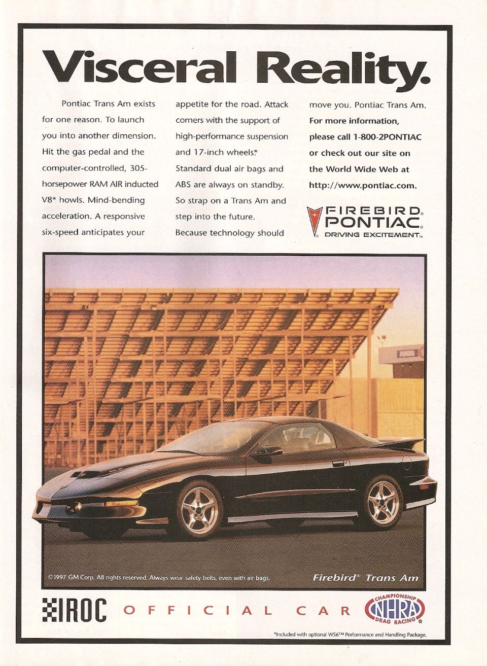 1996 Pontiac Firebird Trans Am coupe parked in front of a wooden structure