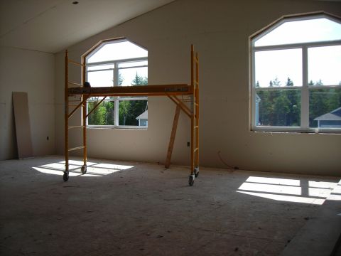 1984 Ford Bronco - Room under construction with scaffolding and windows overlooking the outdoors.