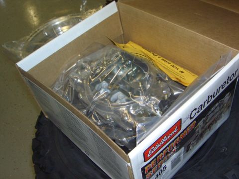 1974 Ford Bronco - A new Edelbrock Performer Series 1405 carburetor is shown inside its original packaging.