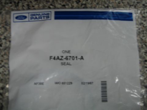 1995 Mercury Cougar - This is a photo of Ford genuine parts packaging for a seal, part number F4AZ-6701-A.