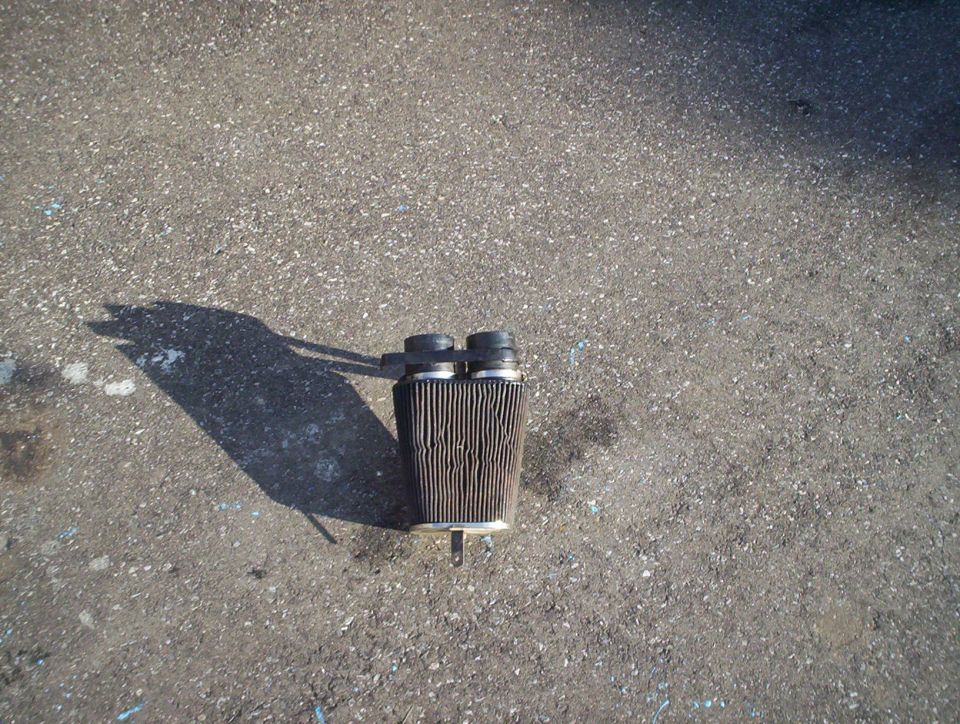 air filter on asphalt ground
