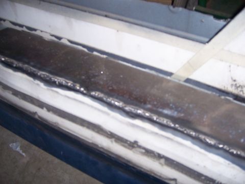 1991 Ford Bronco - A metal strip has been welded onto the vehicle's body, likely for repair or modification.