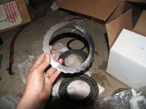 1978 Ford Bronco - Worn clutch plates from an automatic transmission are shown, indicating a need for repair or replacement.