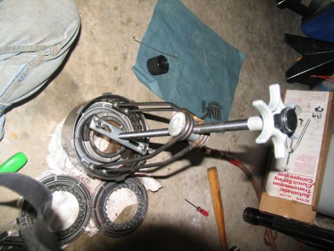 1978 Ford Bronco - A specialized tool is used to compress springs within an automatic transmission clutch assembly.